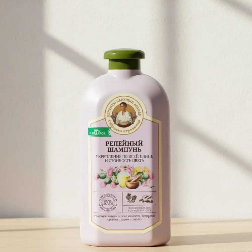 Hair care shampoo bottle with a label on a white background
