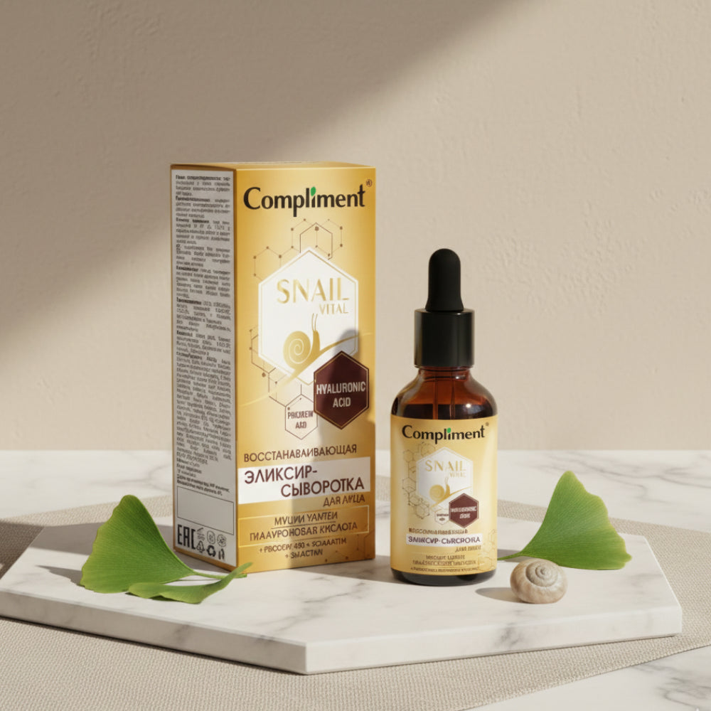 Compliment Snail Repair serum bottle and packaging on a neutral background