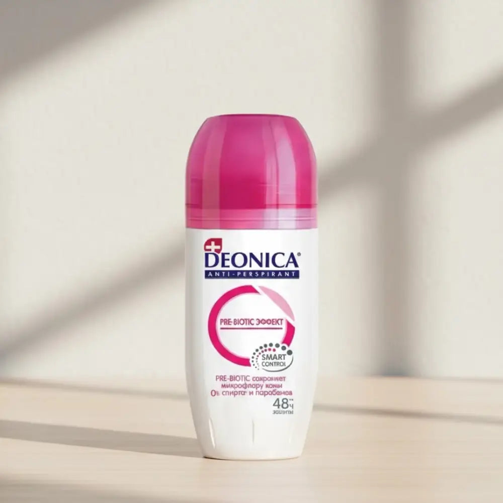 Deonica anti-perspirant bottle with pink cap on a white background