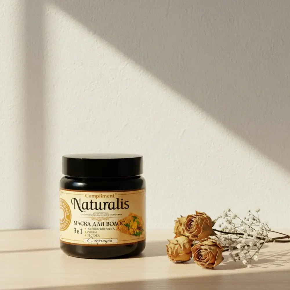 Hair mask jar with black lid and yellow label on a white background
