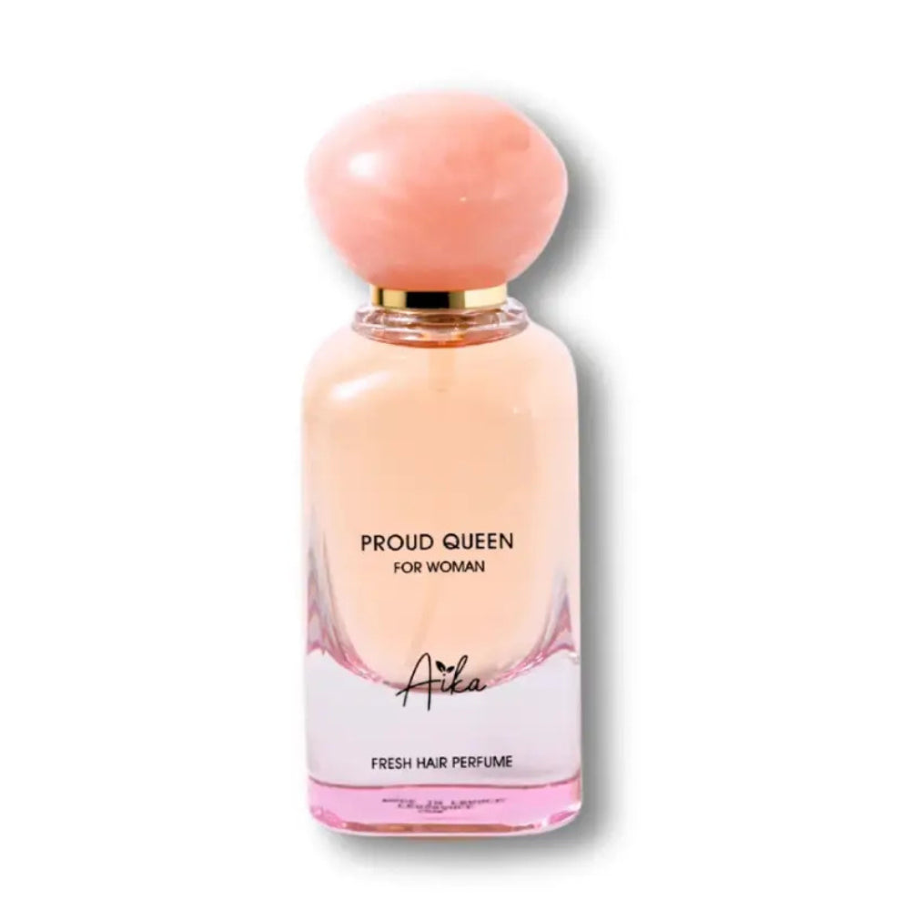 Pink perfume bottle with white roses and a mirror on a light surface