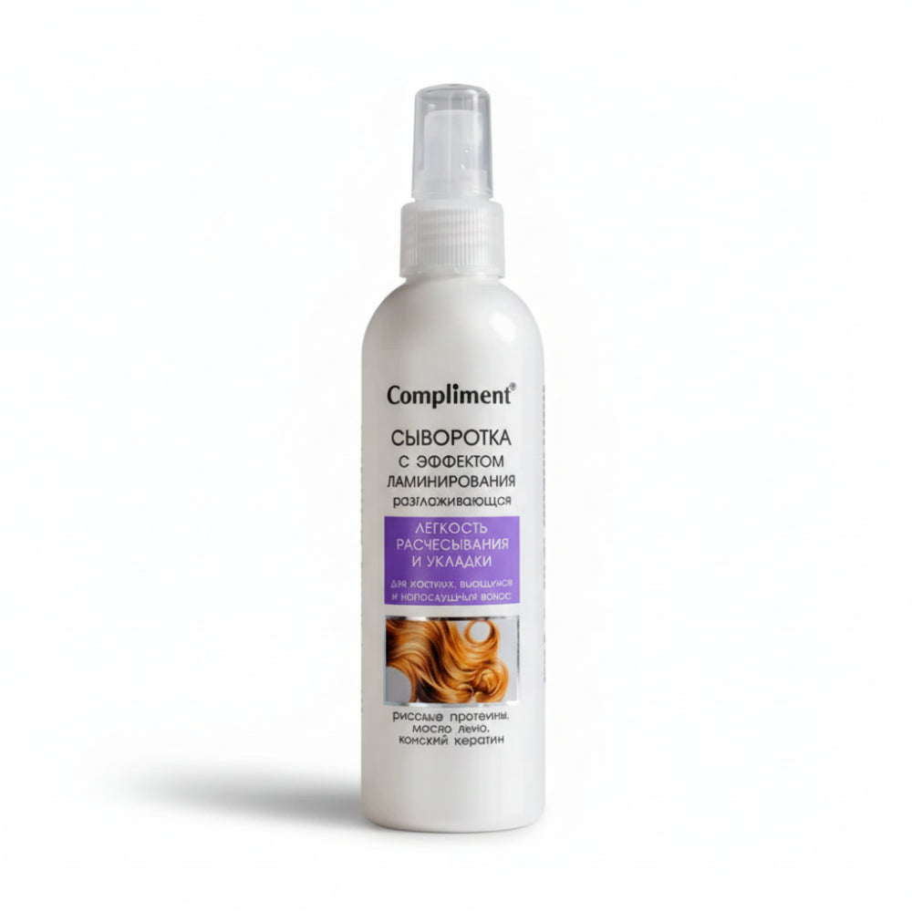 White bottle of 'Compliment' hair serum with a label on a white background